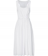 This great maxi-dress of white silk-linen mix is the perfect dress for breezy, summer style - Sleeveless with round neck and racerback, chest patch pocket, and ruffled, gathered waist - Wide skirt lies under decorative folds for textural interest in design - Pair with peep toe heels for garden parties, or with flat sandals for an al fresco lunch date