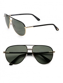 Must-have aviator frames crafted in lightweight metal with tubular temples. Available in black-gold with polarized green lens.Tubular temples100% UV protectionMade in Italy