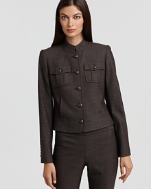 The military trend takes on workday style with this Anne Klein New York jacket, touting a chic stand collar, two tailored pockets and five-button cuffs.