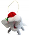 Animals all over the world embrace the season too, like this festively dressed elephant boasting the soft, flexible features and unmistakable style of Annalee ornaments.