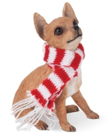 A fetching gift for animal lovers, the Chihuahua Christmas ornament depicts the pint-sized pup waiting patiently for treats and dressed in a holiday scarf. From Sandicast.