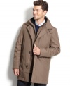 Stay dry on the outside and keep your gadgets safe on the inside with this multi-pocketed Calvin Klein raincoat.