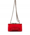 Inject a dose of hard-edge elegance into your outfit with Valentinos bright red leather tonal rockstud shoulder bag, detailed with a front handle perfect for converting into a covetable clutch - Flap with magnetic snap closure underneath, tonal rockstud-adorned front handle, removable chain-link shoulder strap, accordion style with 2 internal sections, inside back wall credit card slot - Carry as a polish to cocktail dresses or tailored separates