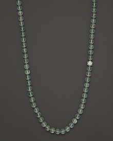 Green fluorite is punctuated by a sparkling topaz bead in this striking necklace from Anzie.