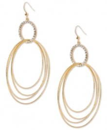 A funky take on classic elegance. These oval hoop earrings from Haskell showcase several hoops dangling from a pave crystal accented ring. Crafted in gold tone mixed metal. Approximate drop: 4-1/10 inches.