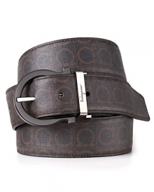 Double the refinement with this versatile belt, featuring sleek, solid leather on one side and a classic pattern of repeating Gancini logos on the other.