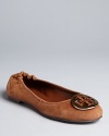 Tory Burch's iconic Reva ballet flats are updated in ultra-soft suede.