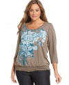 Blossom beauty this season in Style&co.'s three-quarter-sleeve plus size top, featuring a floral-print.