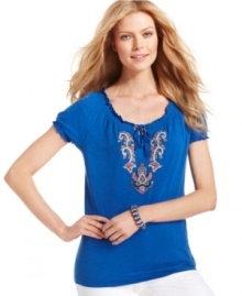 Style&co. adorns this top with bright embroidered detail at the chest and peasant-style details, like a smocked neckline and sleeves. Wear with jeans for a simple but stylish ensemble!