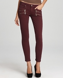 Front exposed zips lend a punk-chic sensibility to these Paige Denim skinny jeans.