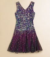 She'll be a real showstopper in this glitzy, sequined frock with full skirt, perfect for twirling and dancing.V-neckSleevelessPullover styleFull skirtFully linedPolyesterDry cleanImported