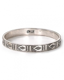 Give in to wanderlust with this Afghani inspired bangle from Low Luv by Erin Wasson. It's a simple silver style that hints at well-travelled chic.