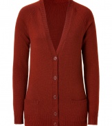 Luxurious cardigan in a fine reddish brown cashmere - Particularly soft, elegant quality - New, long, slim boyfriend style comes down over your hip - Feminine fitted cut - With a deep V-neck d?collet? and two pockets - Stylish, but casual at the same time - Style: casual with jeans, cool with leggings, elegant with a pencil skirt