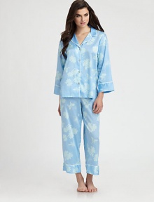 Romantic flowers decorate this classic pajama set in ultra-soft cotton sateen. Notch collarDropped shouldersLong sleevesButton frontContrast piping at neckline and cuffsElasticized waistbandInseam, about 26CottonMachine washImported