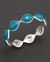 Summer-blue enamel drops over a carved sterling silver bangle By Elizabeth Showers.