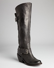 Over-the-knee boots go Western, hot on the trend with smokin' stacked heels and buckled harness details. Rope 'em in!