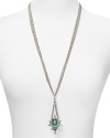 A bold gemstone pendant on this ABS by Allen Schwartz necklace adds interest to edge right metallic links.