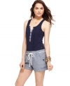 Tommy Girl introduces railroad stripes and a rope belt to the trend-right romper -- and creates a warm weather garb that's teeming with playful style!