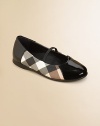 An elastic strap keeps her little feet in place in this stylish pair of patent leather flats with checks.Slip-on with elastic strap50% leather/50% PVC upperLeather liningRubber solePadded insoleImported