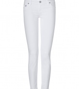 Elevate your cool warm weather staples with these ultra-skinny white jeans from True Religion - Classic five-pocket style, button fly, belt loops - Extra form-fitting, mid-rise - Style with bright tops and fun leather flats