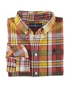 A preppy long-sleeved sport shirt is cut from woven cotton broadcloth in a vibrant plaid.