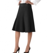 The flared godet skirt in a sketchy heathered fabric by Rafella pairs with crisp shirts and heels to dress up your workweek look.