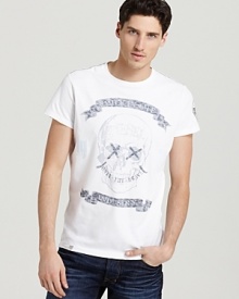 Only the brave is scrawled below a skull graphic on this dramatic tee from Diesel.