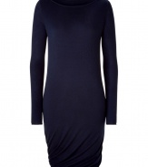 Sumptuously soft and effortlessly elegant, Donna Karans pure, dark blue cashmere knit dress epitomizes understated luxury - Slim cut, with pencil-style skirt, flattering boatneck and long, fitted sleeves - Gorgeous drape detail at hem - Slips on - A versatile compliment to any wardrobe perfect for pairing with ankle booties or platform pumps