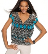 A bold tribal print and a splash of bright color gives INC's peasant top a fresh feel for spring!