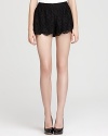 These ladylike Free People lace shorts are scalloped at the hem for an ultra feminine look. Take them out at night with towering, glossy platforms.