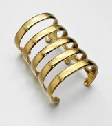 Simple and dramatic, this wide cuff is formed of sleek open bands, creating a look that's both ancient and modern.GoldplatedDiameter, about 2.6Width, about 1.6Made in France