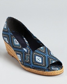 A braided lanyard heel is a welcome update to typical jute on a printed pair of Theodora & Callum wedges.