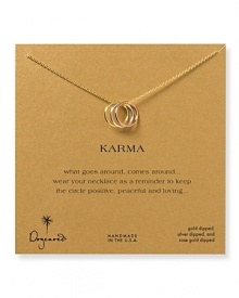 Believe in the power of threes with Dogeared's karma ring-trimmed necklace. Slip this meaningful token on as a reminder that what comes around, goes around.