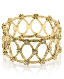 Lovely in lattice. This bangle bracelet from 2028 blends timeless elegance with modern appeal with glass accents and intricate openwork detail. Crafted in gold tone mixed metal. Approximate length: 7 inches.