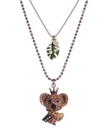 Capture style inspired by the animal kingdom. This cute koala king necklace by Betsey Johnson highlights a chic two-tier design. Crafted in brown mixed metal with crystal accents and a dangling green leaf charm. Approximate length: 16 inches + 3-inch extender. Approximate drop: 1-1/3 inches.