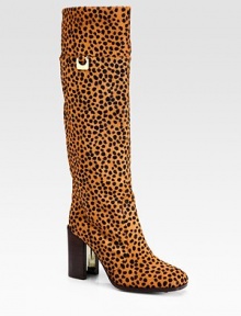 Leopard-print calf hair in a knee-high silhouette with goldtone buckle hardware and a partially lacquered heel. Stacked, lacquered heel, 3½ (90mm)Shaft, 16Leg circumference, 14Leopard-print calf hair upperLeather liningLeather and rubber solePadded insoleImportedOUR FIT MODEL RECOMMENDS ordering one half size up as this style runs small. 