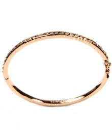 Polished and sleek. Givenchy's rose gold tone bangle bracelet features silk glass stones. Approximate diameter: 2-1/2 inches.