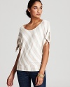 In pale diagonal stripes, this Ella Moss tee goes the extra mile--sleek string ties finish off short dolman sleeves.