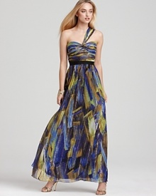 With shimmering, golden stripes, BCBGMAXAZRIA's long, one shouldered dress makes a grand entrance.