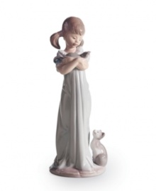 Two little kittens clamor for attention, waiting to snuggle with their sweet friend in the handcrafted Don't Forget Me figurine from Lladro.