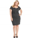 Lend instant polish to your work wardrobe with AGB's short sleeve plus size dress, showcasing a houndstooth print.