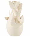 The essence of whimsy, this Lenox Flutter bud vase will lift your spirits with gold-tipped butterflies and elegant banding in timeless ivory porcelain.