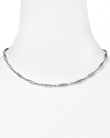 Slip on something simple and sparkly with this hammered silver link necklace from Nadri. It's delicate design hints at understated chic.