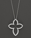 Diamonds set in a 14K. white gold cross pendant.