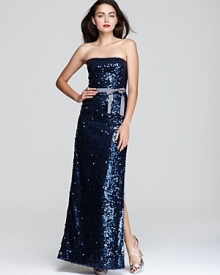 In shimmering, inky sequins, BCBGMAXAZRIA's sparkling dress lends a dazzling look to the evening's events.