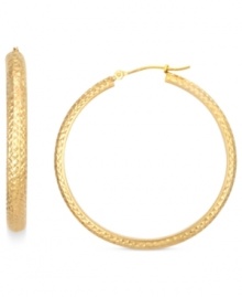 A shining statement. These hoop earrings from YellOra™ display an elegant touch with a textured surface comprised of pure gold, sterling silver and palladium. Approximate diameter: 1-1/2 inches.