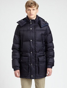 Remain cozy and dry all season long in this quilted nylon puffer, with down-fill for added warmth and large, over-sized pockets to secure all of your personal essentials.Zip-frontRemovable hoodChest slash, waist flap pocketsElasticized waistAbout 33 from shoulder to hemNylonDry cleanImported