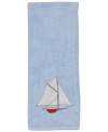 Set sail for uncharted bath decor with this nautical-themed bath towel from Creative Bath. Emblazoned with a seafaring schooner, this plush towel docks beautifully-powder rooms to bathrooms.