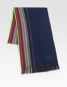 Reversible and multi-striped winter essential impeccably knitted in fine wool.Fringed ends10W x 71LWoolDry cleanImported