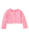 A cute button-front cardigan from Lilly Pulitzer with sweet scalloped trim.